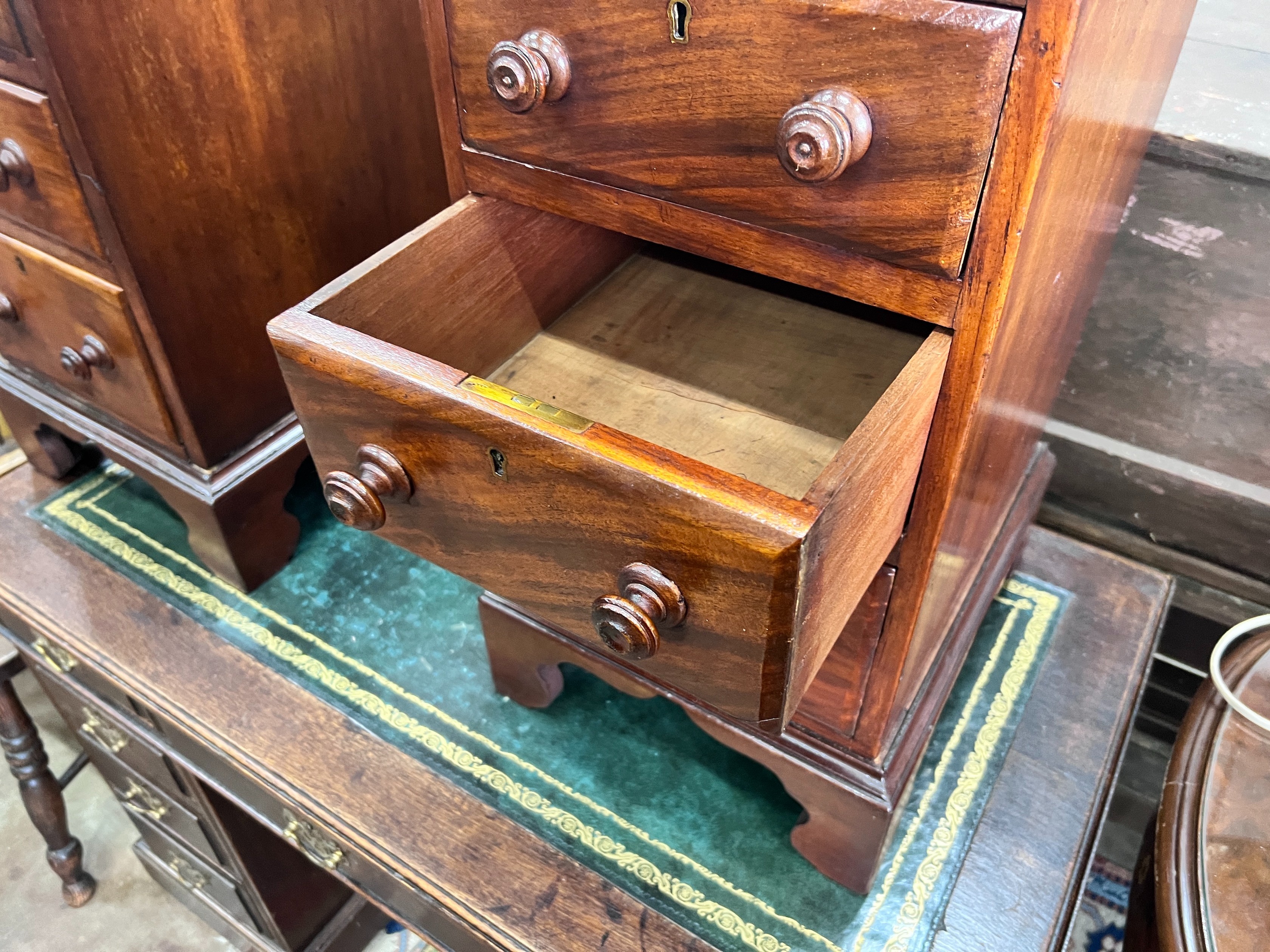 A pair of mahogany bedside chests (converted from desk pedestals), width 34cm, depth 39cm, height 67cm *Please note the sale commences at 9am.
